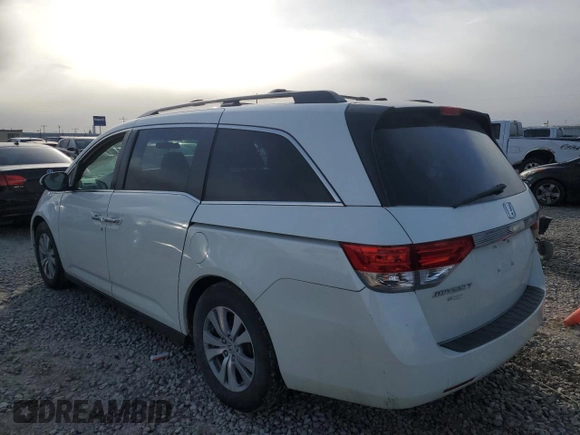 2016 Honda Odyssey SE with VIN 5FNRL5H39GB070652, listed as a Copart auction lot 46358775 with 135,921 mi miles and Salvage Title. Bid and sale history available at DreamBid. Image 2.