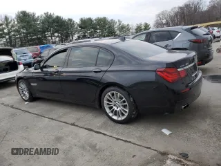 2014 BMW 7 Series 740Li xDrive with VIN WBAYF4C59ED281776, listed as a Copart auction lot 83563234 with 77,899 mi miles and Salvage Title. Bid and sale history available at carsss.com. Image 2.