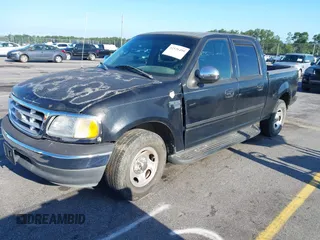 2001 Ford F-150 XLT z VIN 1FTRW07L61KC53030, wystawiony jako IAAI lot #42526499 z przebiegiem 121 675 mil mil oraz . Historia ofert i sprzedaży dostępna na DreamBid. Obrazek 2.