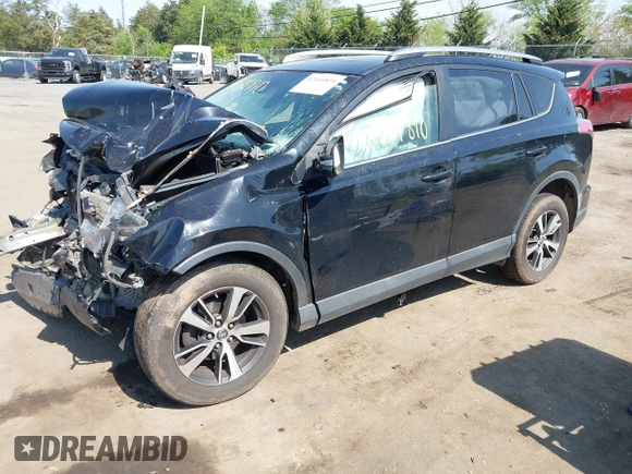 2018 Toyota RAV4 XLE with VIN 2T3WFREVXJW484872, listed as a IAAI auction lot 42144810 with Not provided miles and . Bid and sale history available at DreamBid. Image 18.