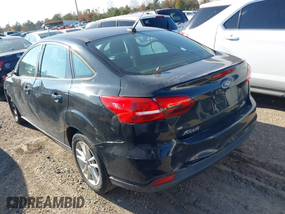 2015 Ford Focus SE with VIN 1FADP3F25FL384068, listed as a IAAI auction lot 40994199 with 1 mi miles. Bid and sale history available at carsss.com. Image 3.
