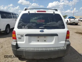 2005 Ford Escape XLT z VIN 1FMYU93145DA04306, wystawiony jako Copart lot #56209425 z przebiegiem 124 956 mil mil oraz Szkoda całkowita • Salvage title. Historia ofert i sprzedaży dostępna na DreamBid. Obrazek 6.