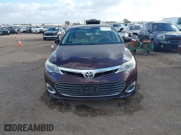 2013 Toyota Avalon XLE with VIN 4T1BK1EB9DU005176, listed as a IAAI auction lot 41545929 with 173,405 mi miles and . Bid and sale history available at DreamBid. Image 12.