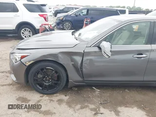 2015 Infiniti Q50 Premium z VIN JN1BV7AR9FM413801, wystawiony jako IAAI lot #42134770 z przebiegiem 111 367 mil mil oraz . Historia ofert i sprzedaży dostępna na DreamBid. Obrazek 6.