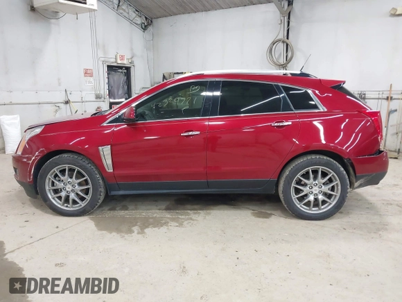 2014 Cadillac SRX Performance Collection z VIN 3GYFNCE30ES596415, wystawiony jako IAAI lot #42329771 z przebiegiem 71 620 mil mil oraz . Historia ofert i sprzedaży dostępna na DreamBid. Obrazek 14.