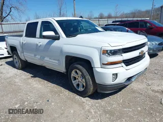 2017 Chevrolet Silverado 1500 LT with VIN 3GCUKREC3HG489701, listed as a IAAI auction lot 41814860 with 218,605 mi miles. Bid and sale history available at carsss.com. Image 1.