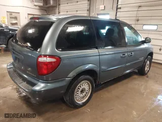 2001 Dodge Caravan Sport with VIN 1B4GP45321B213085, listed as a IAAI auction lot 41529881 with 124,818 mi miles. Bid and sale history available at carsss.com. Image 4.