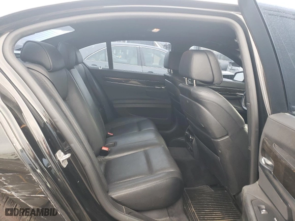 2015 BMW 7 Series 740i with VIN WBAYA6C50FGK16616, listed as a Copart auction lot 74849944 with 125,352 mi miles and Salvage Title. Bid and sale history available at carsss.com. Image 10.