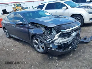 2018 Honda Accord Touring with VIN 1HGCV2F95JA051121, listed as a IAAI auction lot 42654209 with 40,244 mi miles and . Bid and sale history available at DreamBid. Image 1.
