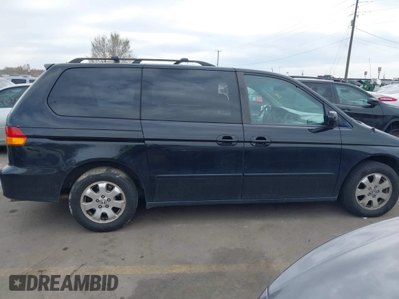 2004 Honda Odyssey EX-L with VIN 5FNRL18914B037976, listed as a IAAI auction lot 41893438 with Not Provided miles and . Bid and sale history available at DreamBid. Image 13.