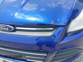 2013 Ford Escape SE z VIN 1FMCU9GX2DUD00321, wystawiony jako IAAI lot #42494558 z przebiegiem 117 600 mil mil oraz . Historia ofert i sprzedaży dostępna na DreamBid. Obrazek 18.