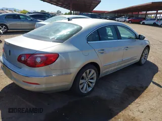 2011 Volkswagen CC Sport with VIN WVWMP7AN0BE723840, listed as a IAAI auction lot 42141612 with 155,616 mi miles. Bid and sale history available at carsss.com. Image 4.