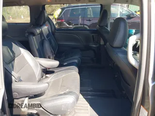 2015 Toyota Sienna SE with VIN 5TDXK3DC3FS682327, listed as a IAAI auction lot 41983156 with 141,640 mi miles. Bid and sale history available at carsss.com. Image 8.