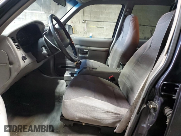 2000 Ford Explorer XLS z VIN 1FMZU72X7YUA71727, wystawiony jako Copart lot #51416935 z przebiegiem 163 005 mil mil oraz Szkoda całkowita • Salvage title. Historia ofert i sprzedaży dostępna na DreamBid. Obrazek 7.