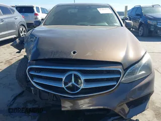 2014 Mercedes-Benz E 550 Sport with VIN WDDHF9BB5EA971894, listed as a IAAI auction lot 41405571 with 113,363 mi miles and . Bid and sale history available at DreamBid. Image 13.