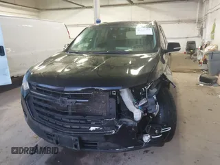 2021 Chevrolet Traverse LT Cloth with VIN 1GNEVGKW4MJ175358, listed as a IAAI auction lot 41355709 with 148,257 mi miles. Bid and sale history available at carsss.com. Image 6.