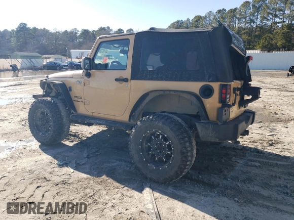 2013 Jeep Wrangler Sport with VIN 1C4AJWAG5DL638636, listed as a Copart auction lot 45197865 with 127,587 mi miles and Salvage title. Bid and sale history available at DreamBid. Image 2.
