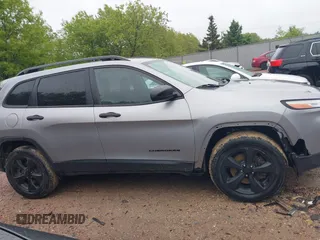 2016 Jeep Cherokee Sport z VIN 1C4PJMAB4GW314079, wystawiony jako IAAI lot #42291146 z przebiegiem 143 901 mil mil oraz . Historia ofert i sprzedaży dostępna na DreamBid. Obrazek 13.