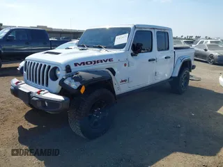 2023 Jeep Gladiator Mojave z VIN 1C6JJTEG7PL536582, wystawiony jako IAAI lot #42074073 z przebiegiem 34 262 mil mil oraz . Historia ofert i sprzedaży dostępna na DreamBid. Obrazek 2.