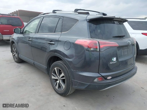 2018 Toyota RAV4 XLE with VIN JTMWFREV4JD110397, listed as a IAAI auction lot 41703342 with 93,206 mi miles. Bid and sale history available at carsss.com. Image 3.