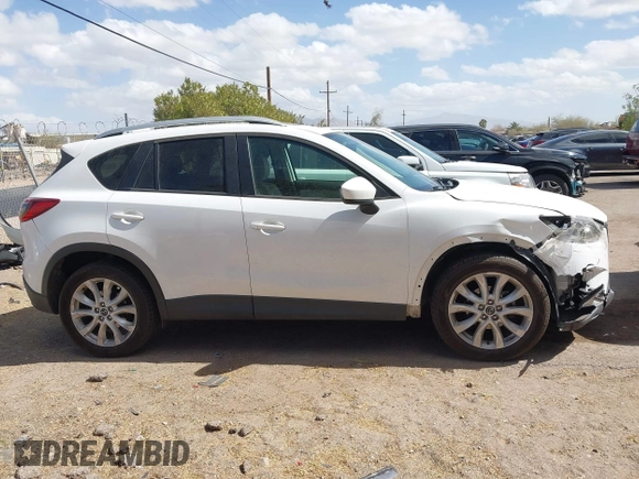 2013 Mazda CX-5 Grand Touring with VIN JM3KE4DE0D0148590, listed as a IAAI auction lot 41685993 with 189,843 mi miles. Bid and sale history available at carsss.com. Image 13.