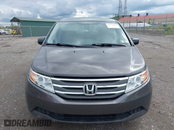 2012 Honda Odyssey EX-L with VIN 5FNRL5H68CB060487, listed as a IAAI auction lot 42176223 with 234,078 mi miles and . Bid and sale history available at DreamBid. Image 13.