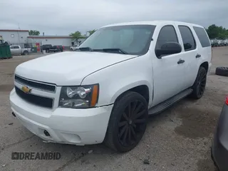 2012 Chevrolet Tahoe Commercial with VIN 1GNLC2E02CR322901, listed as a IAAI auction lot 42679887 with 251,794 mi miles and . Bid and sale history available at DreamBid. Image 2.
