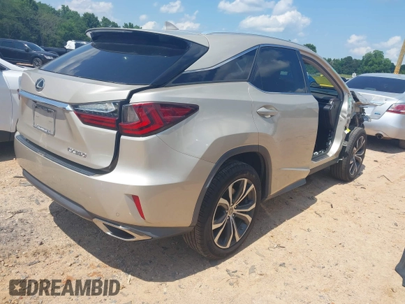 2016 Lexus RX 350 z VIN 2T2ZZMCA0GC003341, wystawiony jako IAAI lot #42487906 z przebiegiem 110 587 mil mil oraz . Historia ofert i sprzedaży dostępna na DreamBid. Obrazek 4.