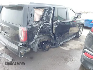 2016 GMC Yukon SLE with VIN 1GKS2AKC3GR398556, listed as a IAAI auction lot 41585972 with 130,961 mi miles. Bid and sale history available at carsss.com. Image 6.