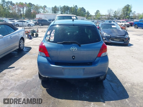 2010 Toyota Yaris with VIN JTDJT4K36A5285298, listed as a IAAI auction lot 42003609 with 158,418 mi miles. Bid and sale history available at carsss.com. Image 16.