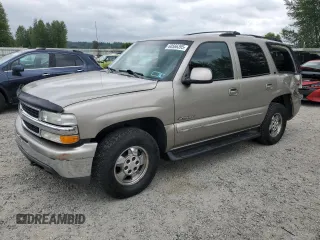 2000 Chevrolet Tahoe LT with VIN 1GNEK13T6YJ127909, listed as a Copart auction lot 60566395 with 162,020 mi miles and Salvage title. Bid and sale history available at DreamBid. Image 1.