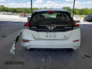 2021 Nissan LEAF SL Plus с VIN 1N4BZ1DV3MC555061, выставлен на аукционе Copart как лот 55882525 с пробегом 55 812 миль миль и Списание • Salvage title. История ставок и продаж доступна на DreamBid. Изображение 6.