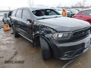 2015 Dodge Durango R/T with VIN 1C4SDHCT4FC169494, listed as a IAAI auction lot 41190653 with 177,887 mi miles and . Bid and sale history available at carsss.com. Image 1.