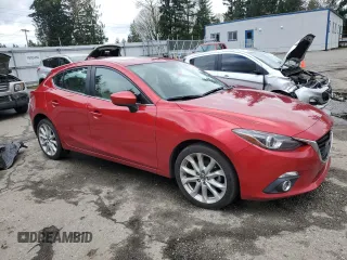 2015 Mazda 3 S Grand Touring with VIN JM1BM1M33F1236684, listed as a Copart auction lot 52164405 with 121,139 mi miles and Salvage Title. Bid and sale history available at DreamBid. Image 4.