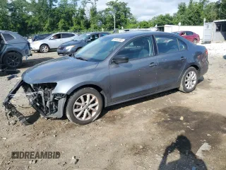 2015 Volkswagen Jetta SE with VIN 3VWD17AJ4FM276053, listed as a Copart auction lot 63663385 with 140,348 mi miles and Salvage title. Bid and sale history available at DreamBid. Image 1.