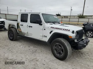 2022 Jeep Gladiator Rubicon with VIN 1C6JJTBG1NL119900, listed as a Copart auction lot 72457754 with 70,055 mi miles and Salvage title. Bid and sale history available at DreamBid. Image 4.