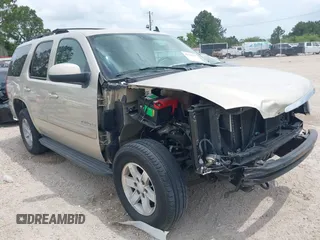 2007 GMC Yukon SLE with VIN 1GKFC13097R327218, listed as a IAAI auction lot 42142633 with 135,206 mi miles and . Bid and sale history available at DreamBid. Image 1.