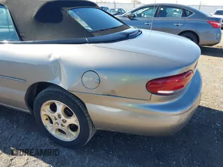 1999 Chrysler Sebring JXi with VIN 3C3EL55H8XT571486, listed as a IAAI auction lot 40755184 with 163,286 mi miles and . Bid and sale history available at DreamBid. Image 12.