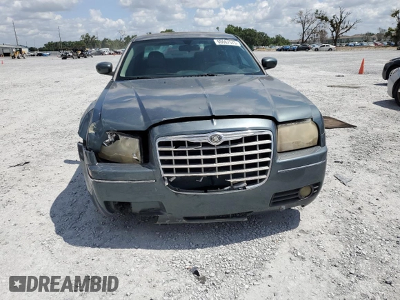 2005 Chrysler 300 Touring z VIN 2C3JA53G95H546536, wystawiony jako Copart lot #60667575 z przebiegiem 163 625 mil mil oraz Szkoda całkowita • Salvage title. Historia ofert i sprzedaży dostępna na DreamBid. Obrazek 5.