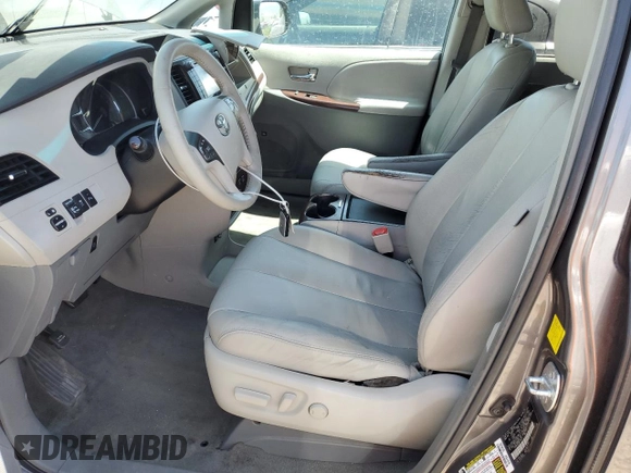 2011 Toyota Sienna XLE AAS with VIN 5TDYK3DCXBS134341, listed as a Copart auction lot 61602705 with 184,959 mi miles and Clean title. Bid and sale history available at DreamBid. Image 7.