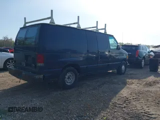 2002 Ford Econoline Cargo with VIN 1FTRE142X2HA67221, listed as a IAAI auction lot 42079493 with 180,324 mi miles. Bid and sale history available at carsss.com. Image 4.