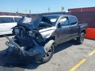 2017 Toyota Tacoma SR5 with VIN 3TMCZ5AN0HM098367, listed as a IAAI auction lot 42299298 with 69,770 mi miles and . Bid and sale history available at DreamBid. Image 2.