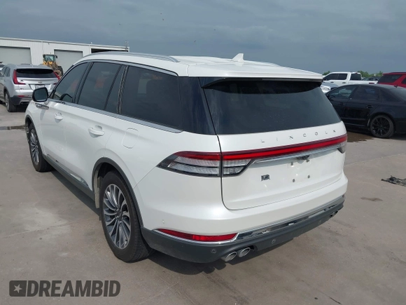 2020 Lincoln Aviator Reserve with VIN 5LM5J7WC1LGL28593, listed as a IAAI auction lot 42137327 with 83,114 mi miles and . Bid and sale history available at DreamBid. Image 3.