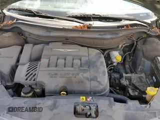 2007 Chrysler Pacifica z VIN 2A8GF48X67R158762, wystawiony jako Copart lot #70044154 z przebiegiem 209 816 mil mil oraz Nie do naprawy • Non repairable. Historia ofert i sprzedaży dostępna na DreamBid. Obrazek 7.