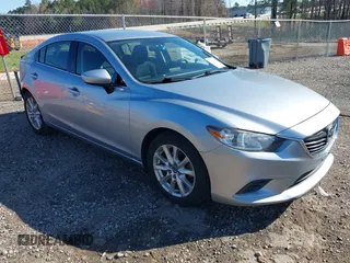 2016 Mazda 6 i Sport with VIN JM1GJ1U50G1412026, listed as a IAAI auction lot 41820838 with 130,262 mi miles and . Bid and sale history available at DreamBid. Image 1.