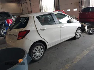 2015 Toyota Yaris L with VIN VNKKTUD38FA041692, listed as a IAAI auction lot 41158412 with Not Provided miles. Bid and sale history available at carsss.com. Image 4.