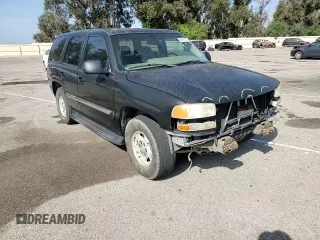2001 GMC Yukon SLT z VIN 1GKEC13TX1J134930, wystawiony jako Copart lot #56724775 z przebiegiem 226 576 mil mil oraz Szkoda całkowita • Salvage title. Historia ofert i sprzedaży dostępna na DreamBid. Obrazek 14.