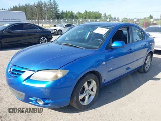 2006 Mazda 3 S Grand Touring with VIN JM1BK323561436552, listed as a IAAI auction lot 42218078 with 244,217 mi miles and . Bid and sale history available at DreamBid. Image 2.