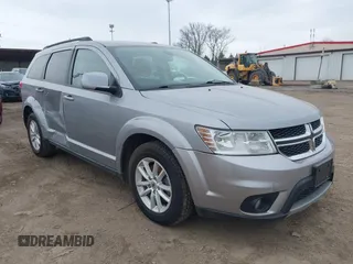 2019 Dodge Journey SE with VIN 3C4PDCBBXKT810874, listed as a IAAI auction lot 41960889 with 170,441 mi miles and . Bid and sale history available at DreamBid. Image 1.