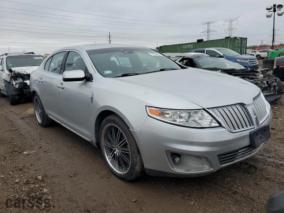 2010 Lincoln MKS with VIN 1LNHL9ER5AG610289, listed as a Copart auction lot 79739834 with 112,421 mi miles and Salvage Title. Bid and sale history available at carsss.com. Image 4.